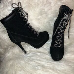 Sleek Black Lace-Up Paprika Platform Boots